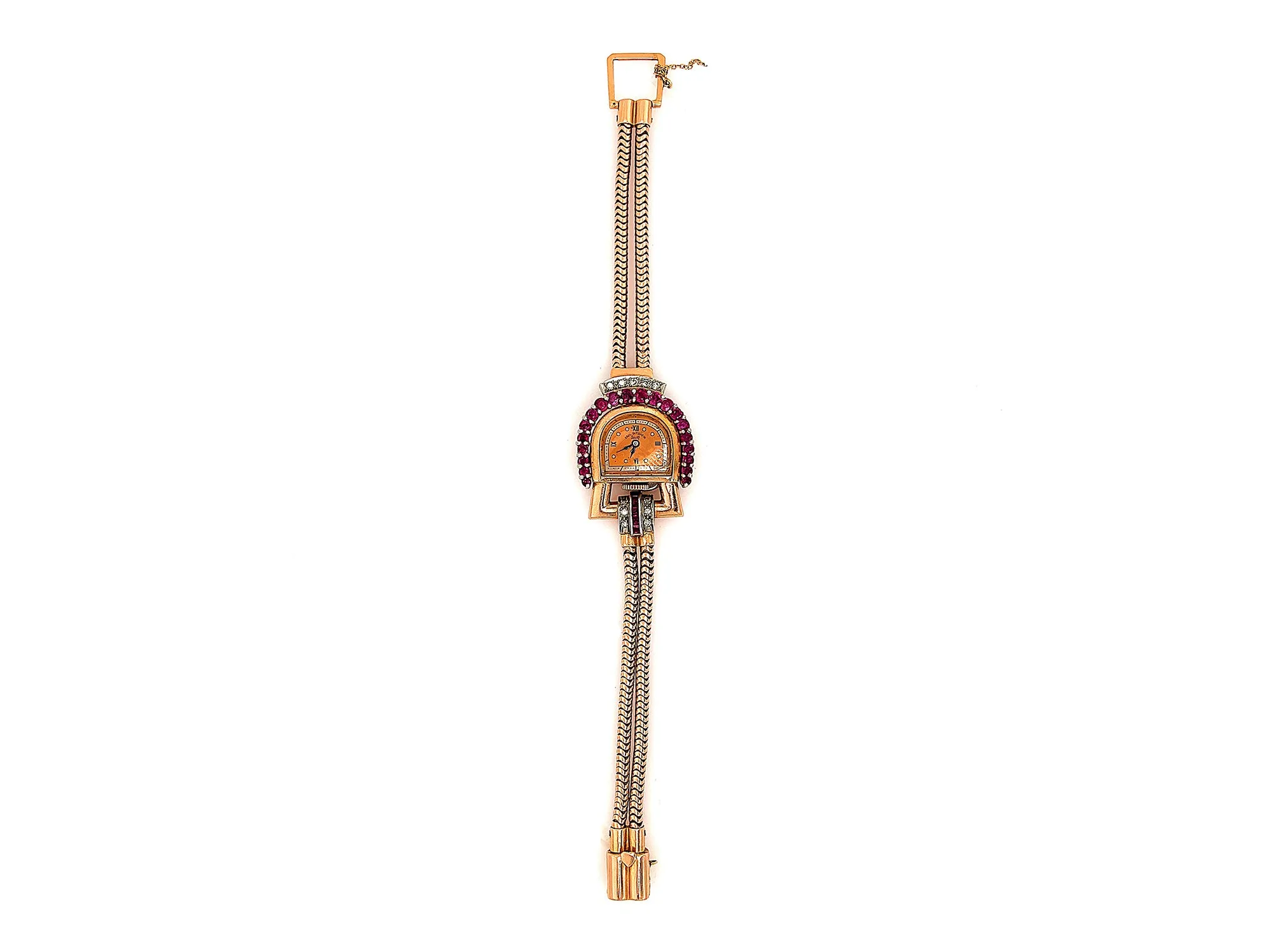 A retro Paul Dititshiem 14K rose gold dress watch with rubies and diamonds. Circa 1940
