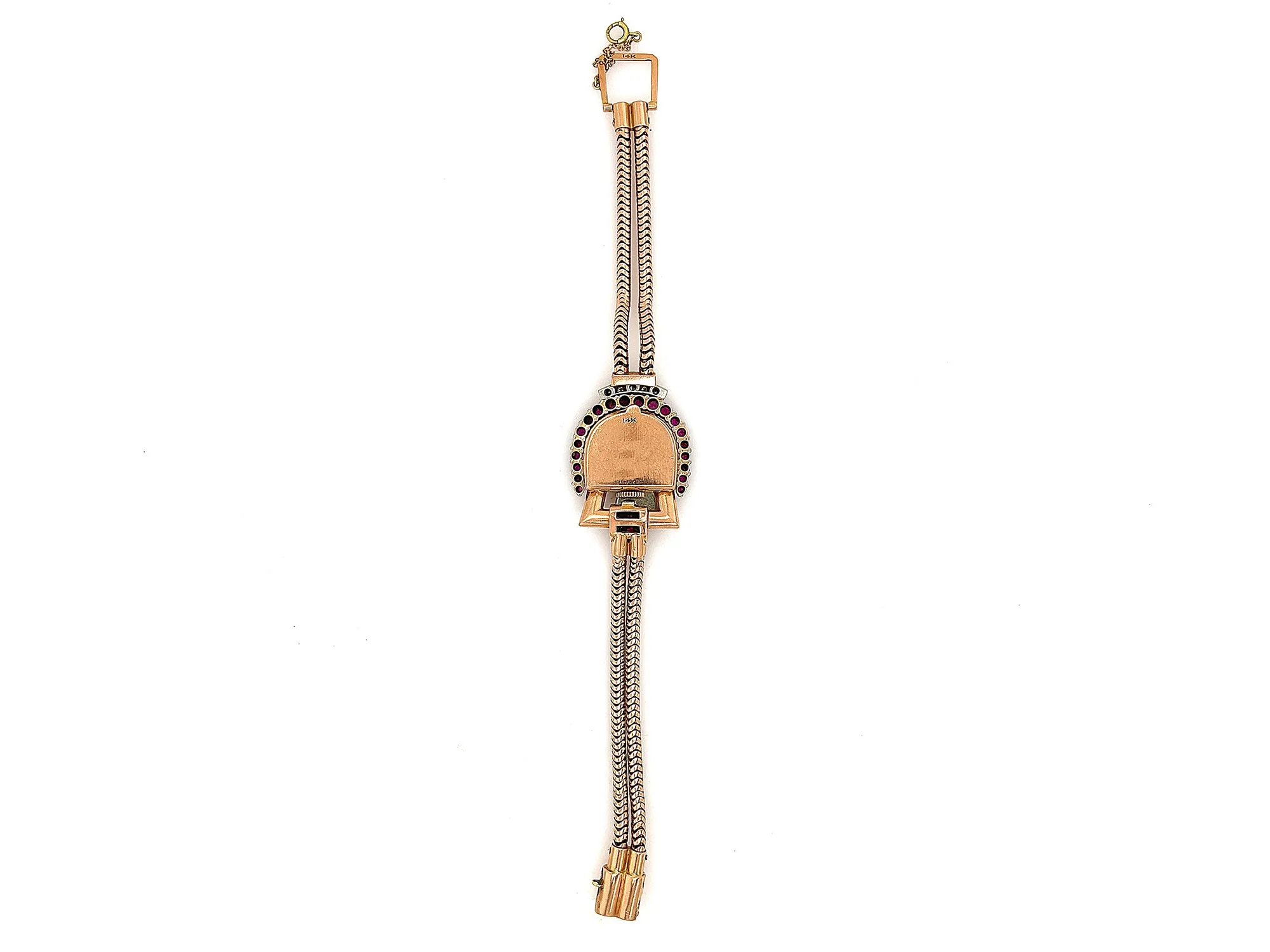 A retro Paul Dititshiem 14K rose gold dress watch with rubies and diamonds. Circa 1940