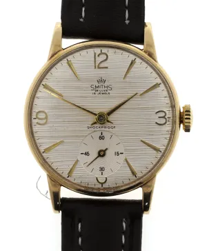 DELUXE SMITHS 9CT GOLD BRITISH RAIL WRISTWATCH IN GOOD CONDITION WITH PATTERNED DIAL 1966