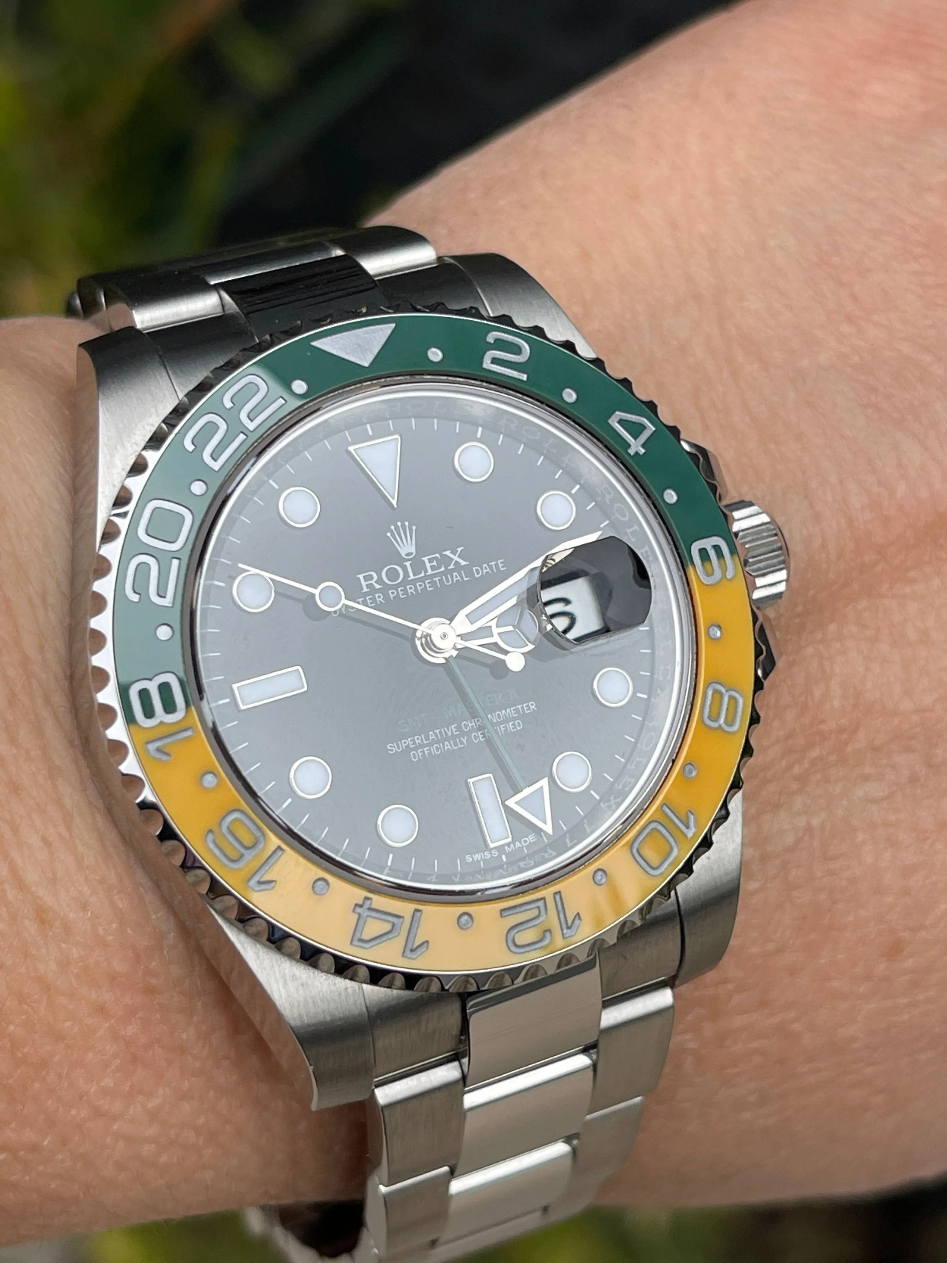 Rolex men’s stainless steel 40mm GMT Master II116710.  Custom yellow and green “Sprite”