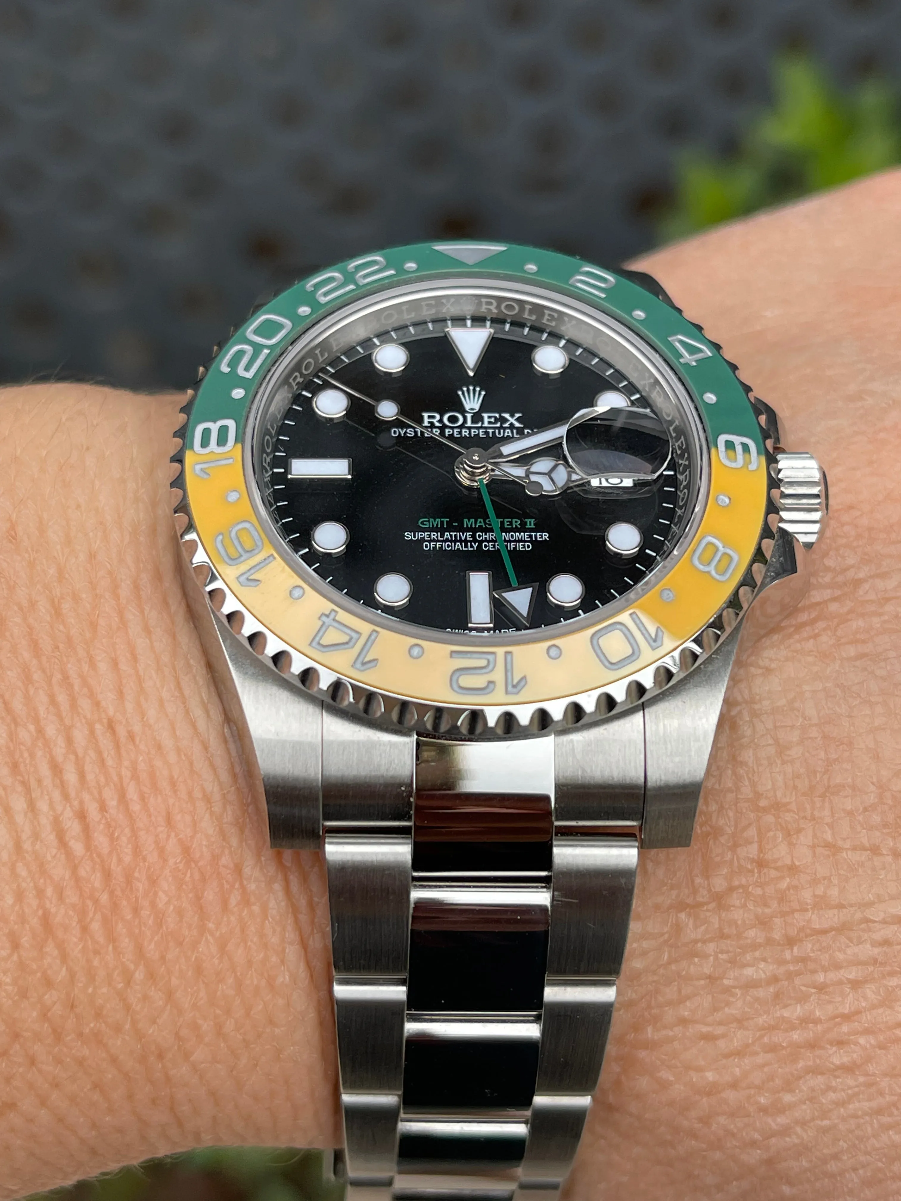 Rolex men’s stainless steel 40mm GMT Master II116710.  Custom yellow and green “Sprite”